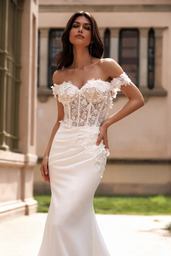 Corset transparent et bretelles tombantes à fleurs 3D d'une robe de mariée sirène